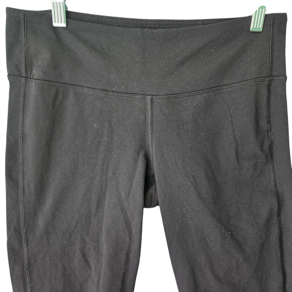 Athleta Black Capri Leggings‎ Strappy Lattice Hem Yoga Pants Womens Size Medium